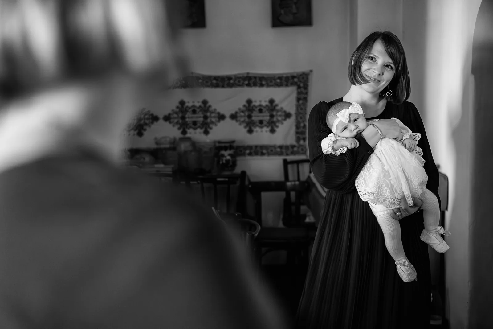 Botezul Norei — botez doubletree hilton cluj bw mama nora broderie foreground — fotograf botez
